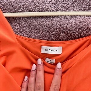 Orange babaton bodysuit